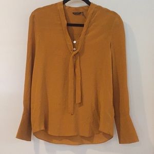 Marciano rust colored silk top